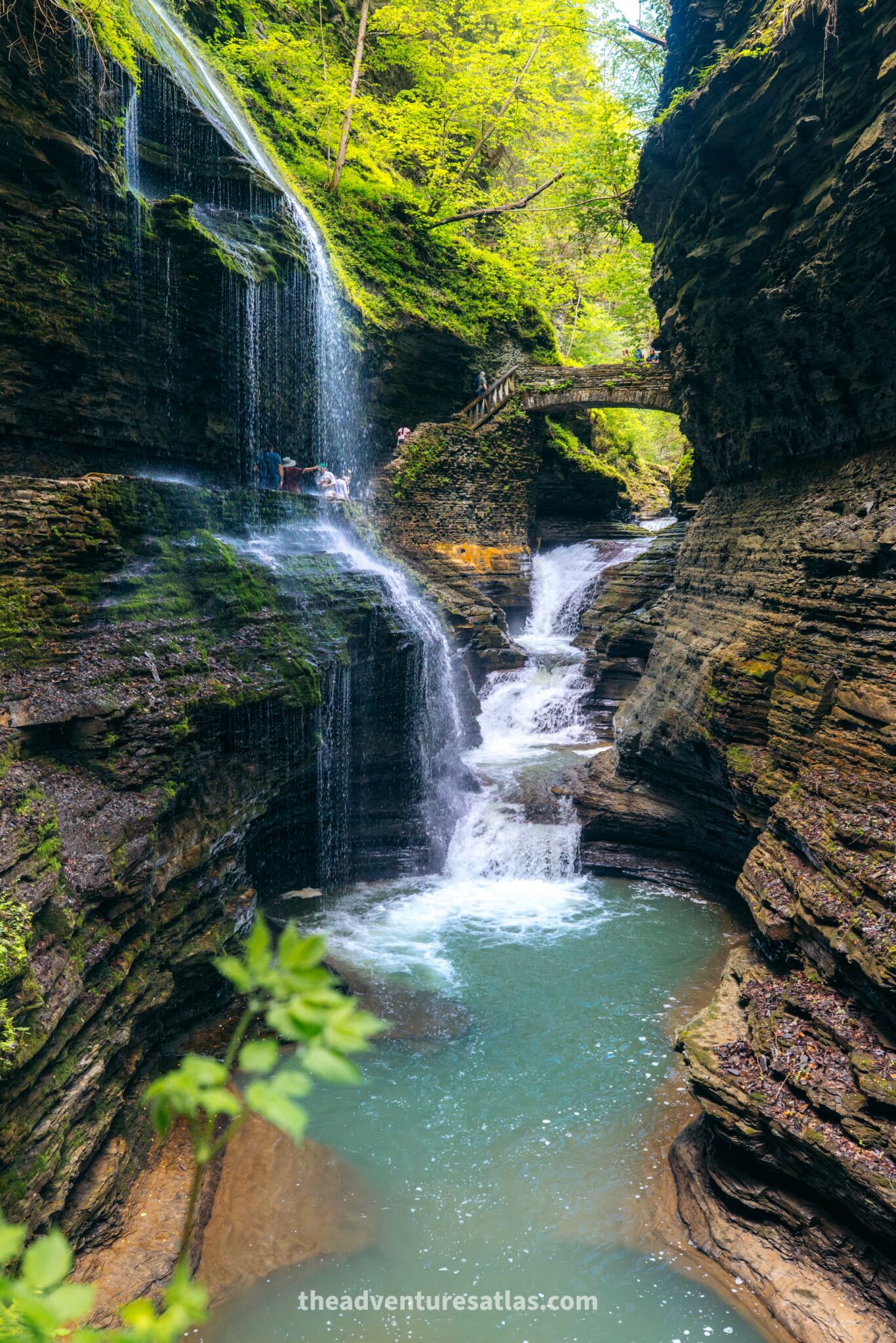 View of Triple Cascade and Rainbow Falls in Glen Creek in the summer in Watkins Glen State Park in the Finger Lakes of New York