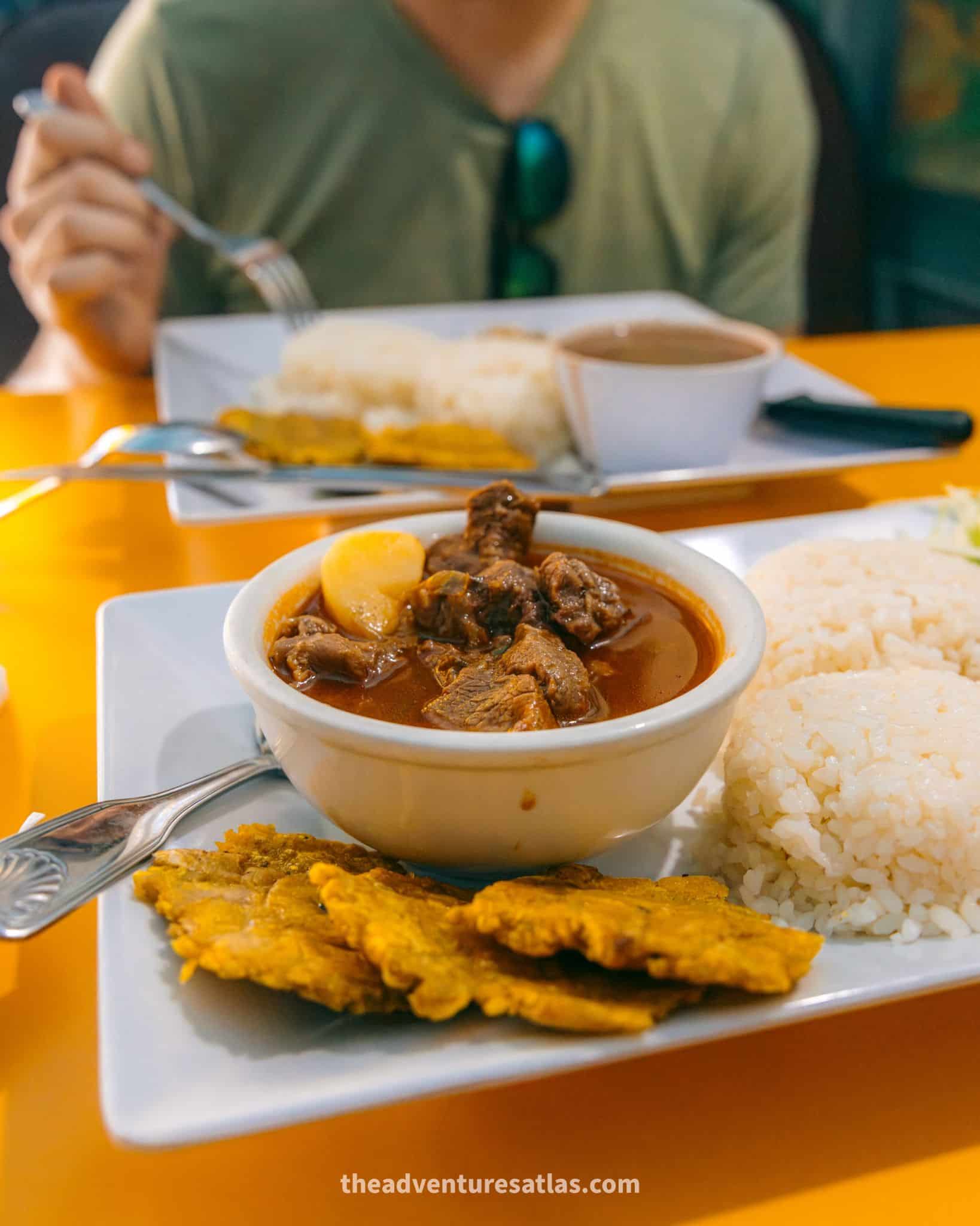 Beef stew, rice, and fried plantains at El Tren de Cano in Puerto Rico