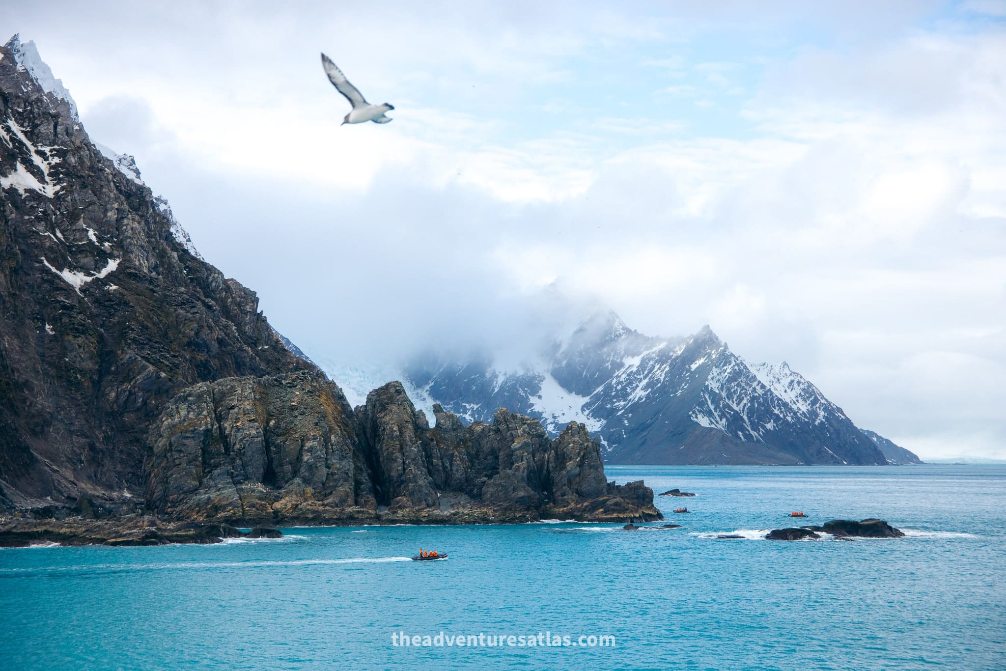 The rugged, glacier-covered mountains of Elephant Island, Antarctica, rising dramatically from the sea